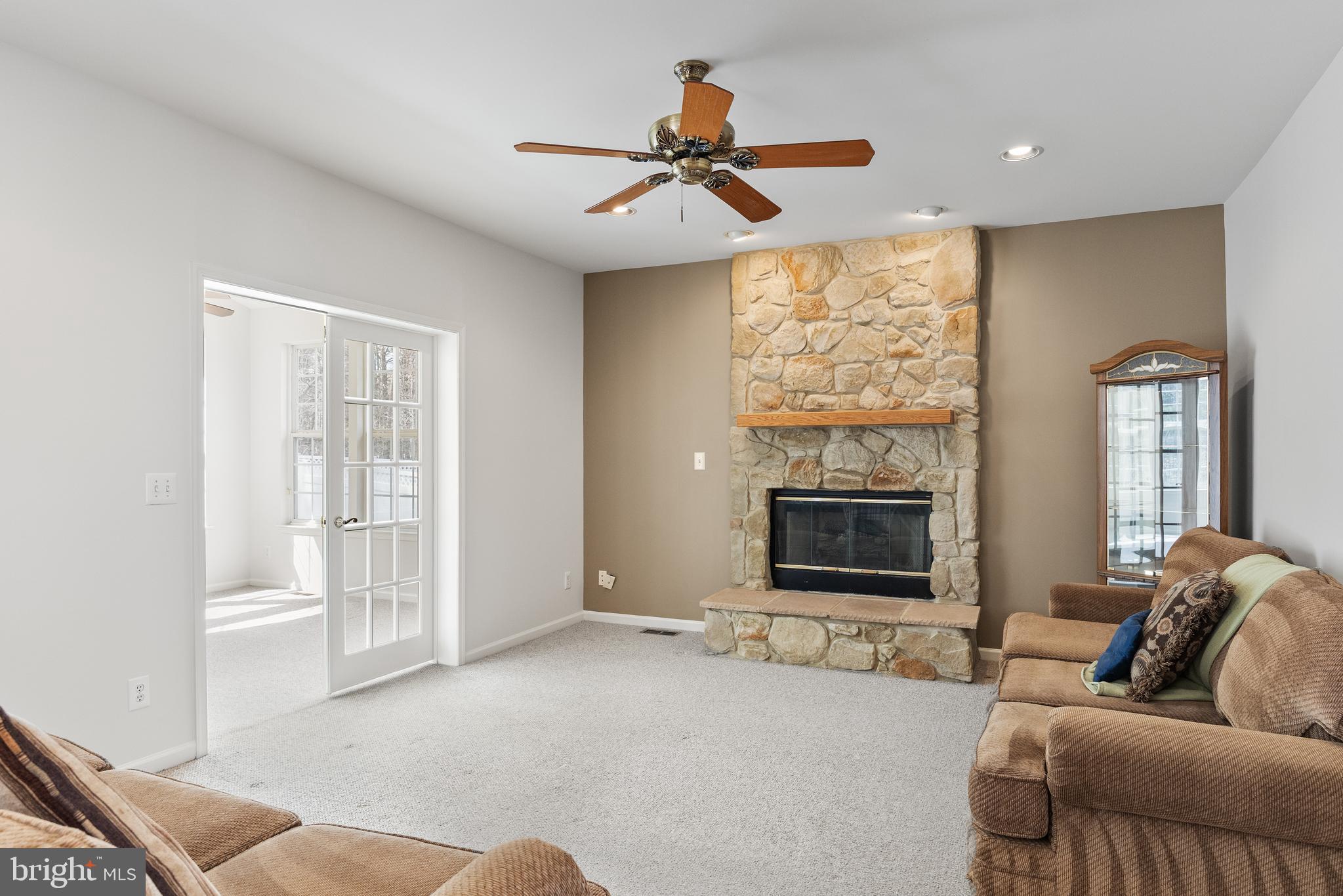 49 Cranberry Lane Delran, NJ 08075 - Photo 10 of 33 a living room with furniture and a flat screen tv