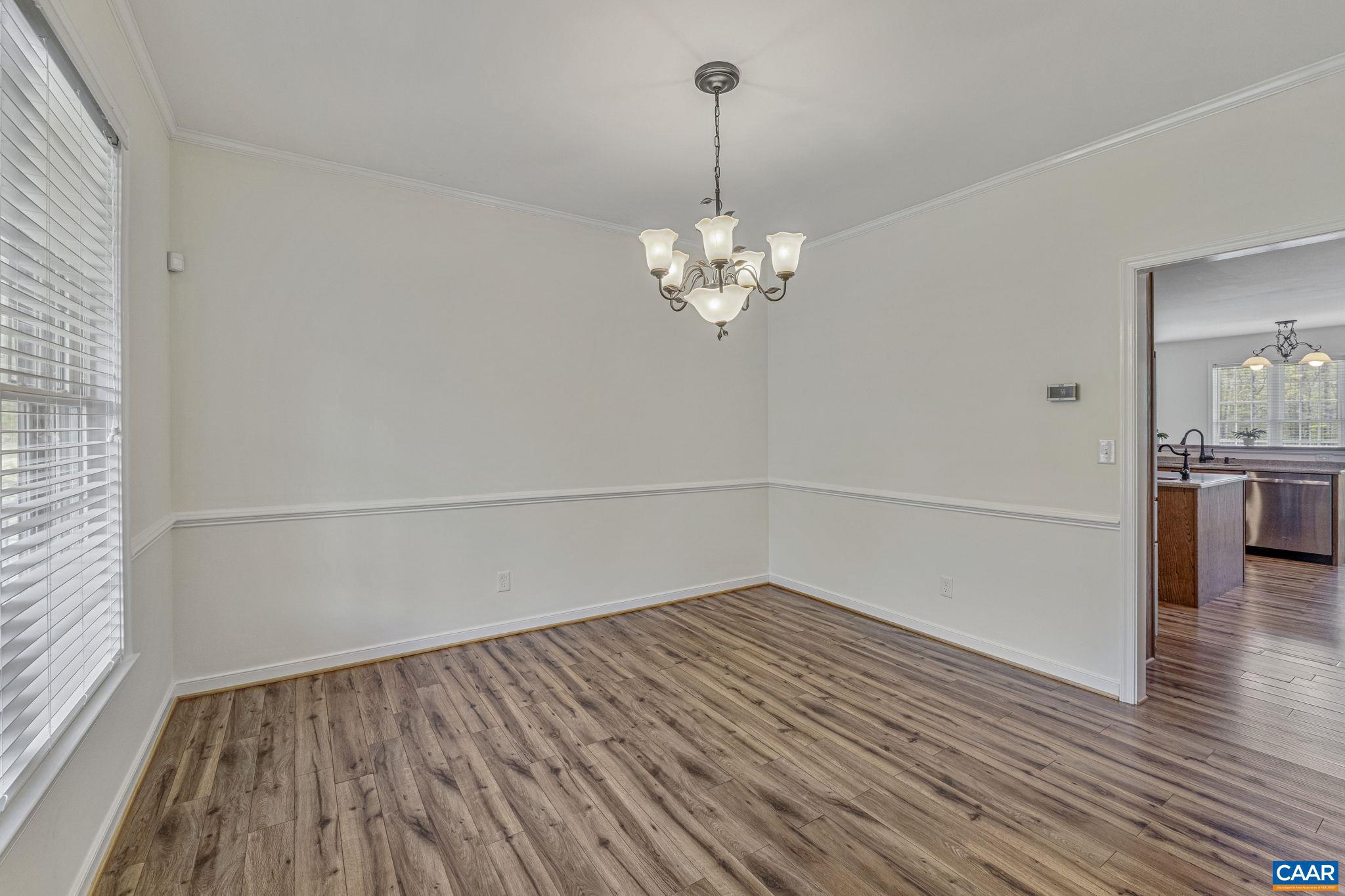 1130 Race Ground Road Rochelle, VA 22738 - Photo 14 of 58 a view of a room with wooden floor and a gate