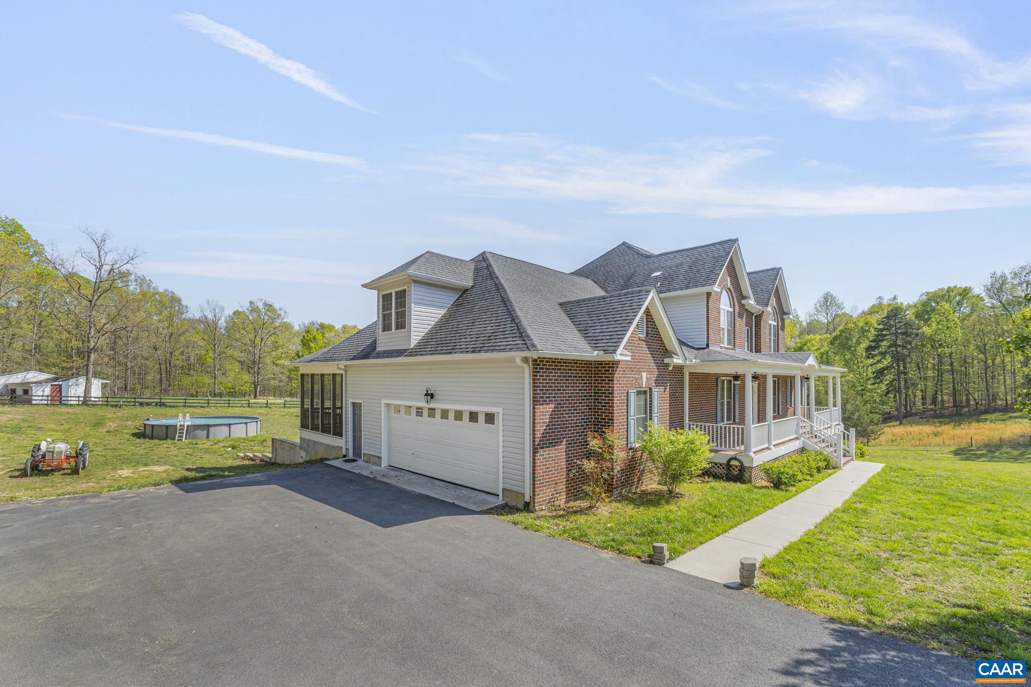 1130 Race Ground Road Rochelle, VA 22738 - Photo 2 of 58 front view of a house with a yard
