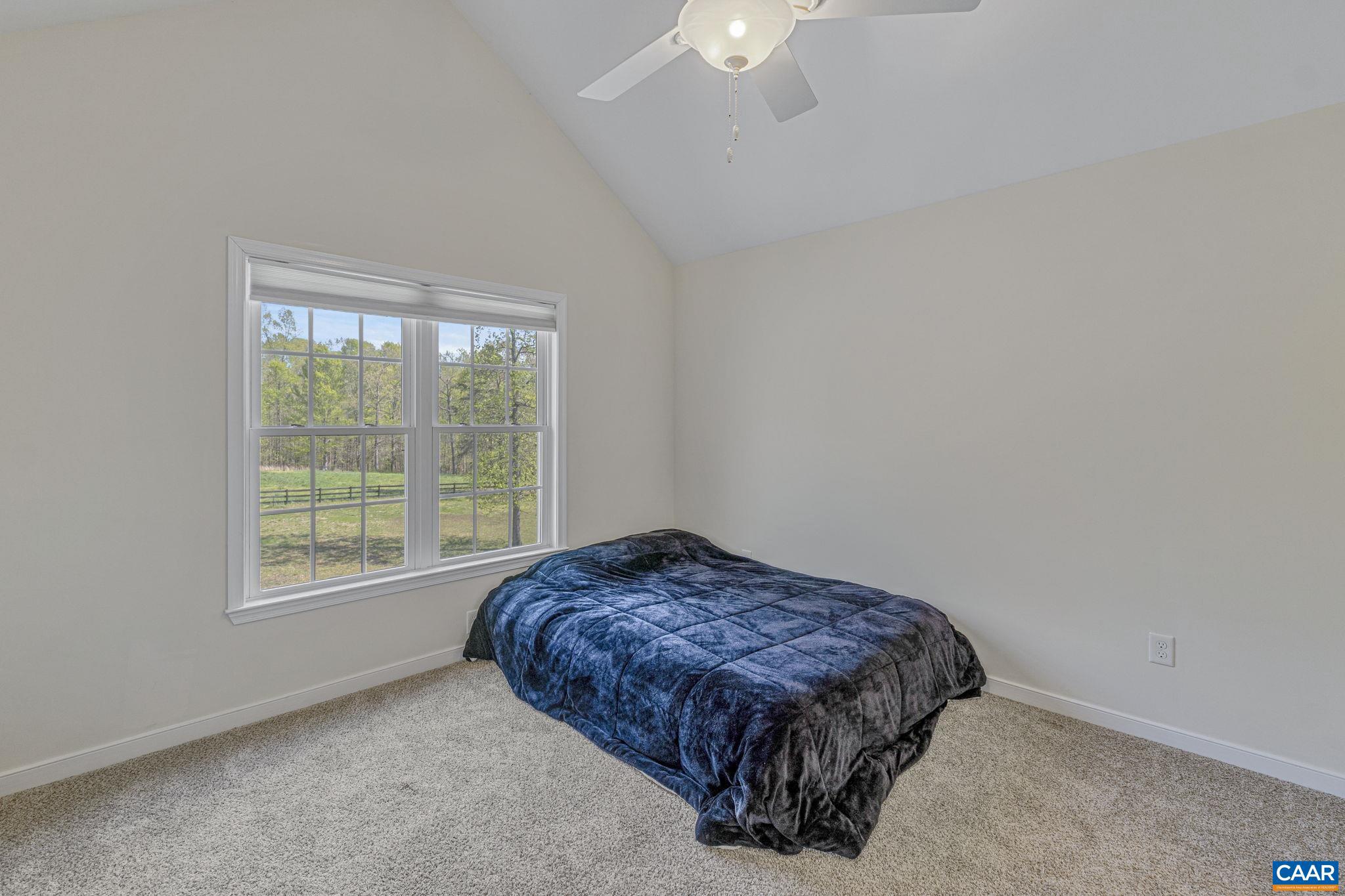 1130 Race Ground Road Rochelle, VA 22738 - Photo 42 of 58 a bedroom with a bed and a window