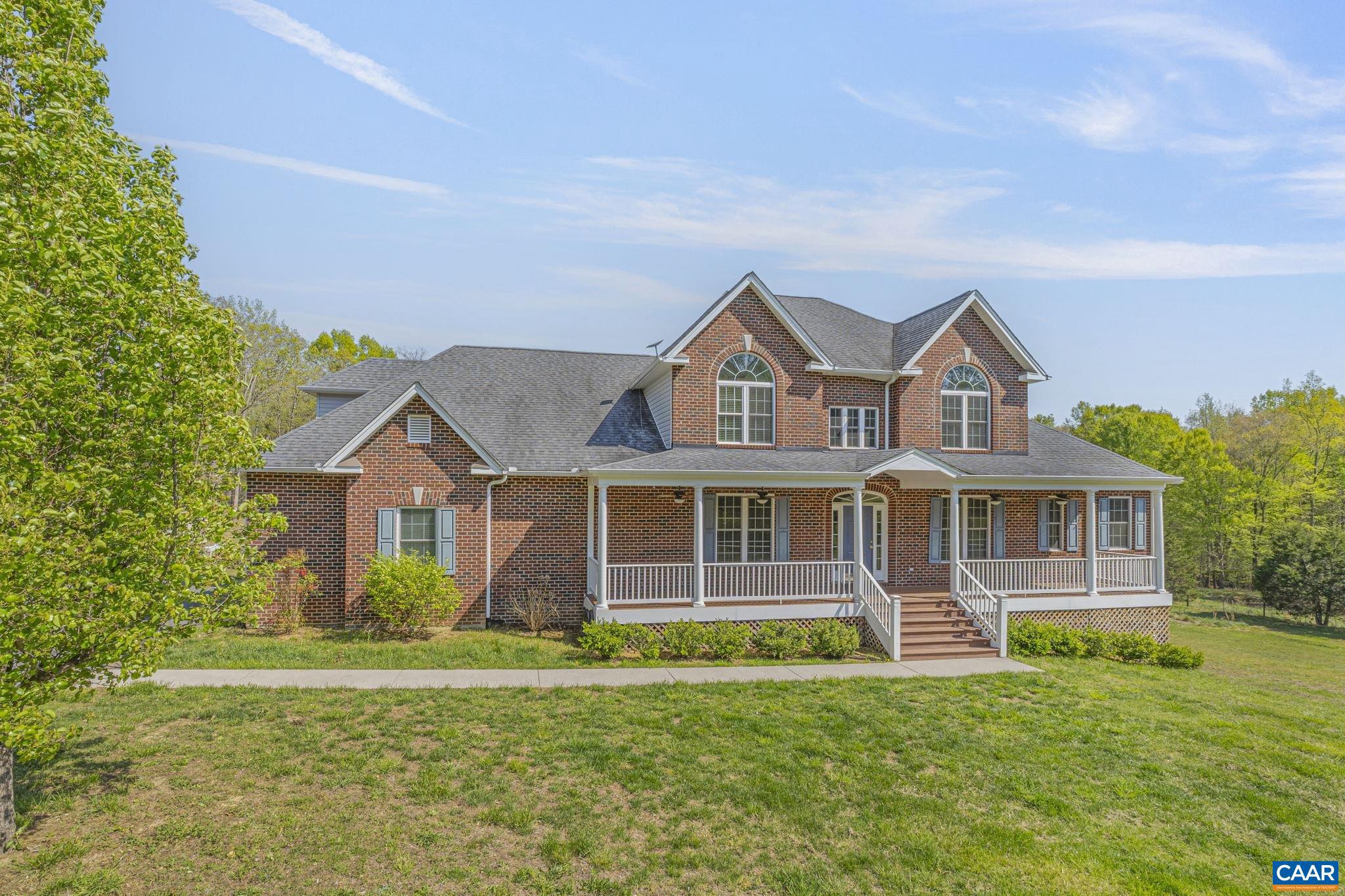 1130 Race Ground Road Rochelle, VA 22738 - Photo 58 of 58 a front view of a house with a garden