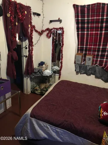 a view of a house with a cars park