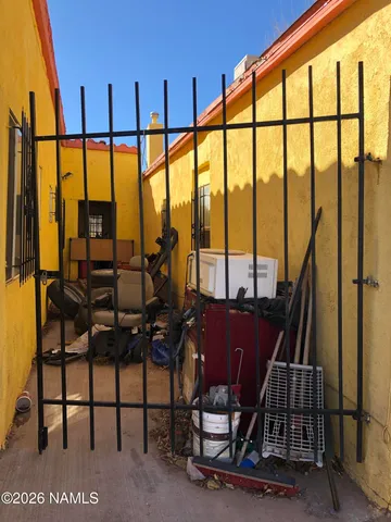 a kitchen with stainless steel appliances granite countertop a sink dishwasher stove and refrigerator