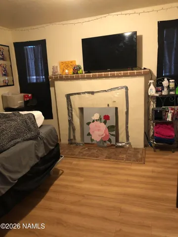 a view of a workspace with furniture