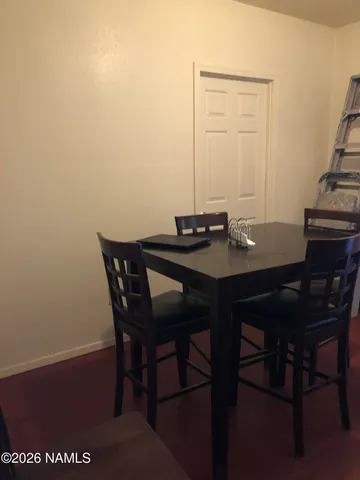 a kitchen with stainless steel appliances granite countertop a refrigerator stove and sink