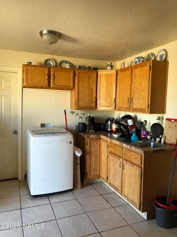 a utility room with washer and dryer