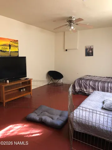 a bedroom with a bed and furniture