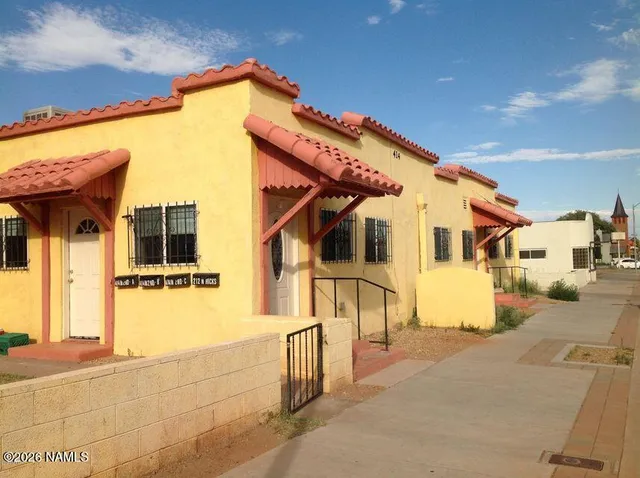 a vase of flowers sitting on a table