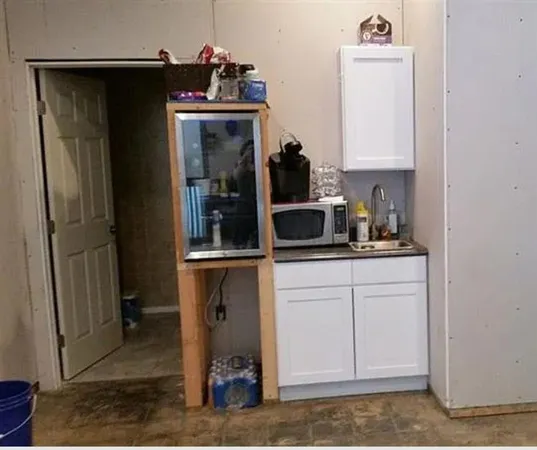 a view of storage and utility room