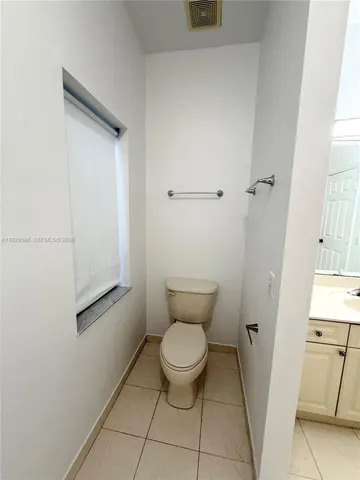 a bathroom with a toilet