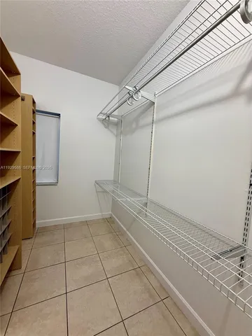 a view of a room with an empty space