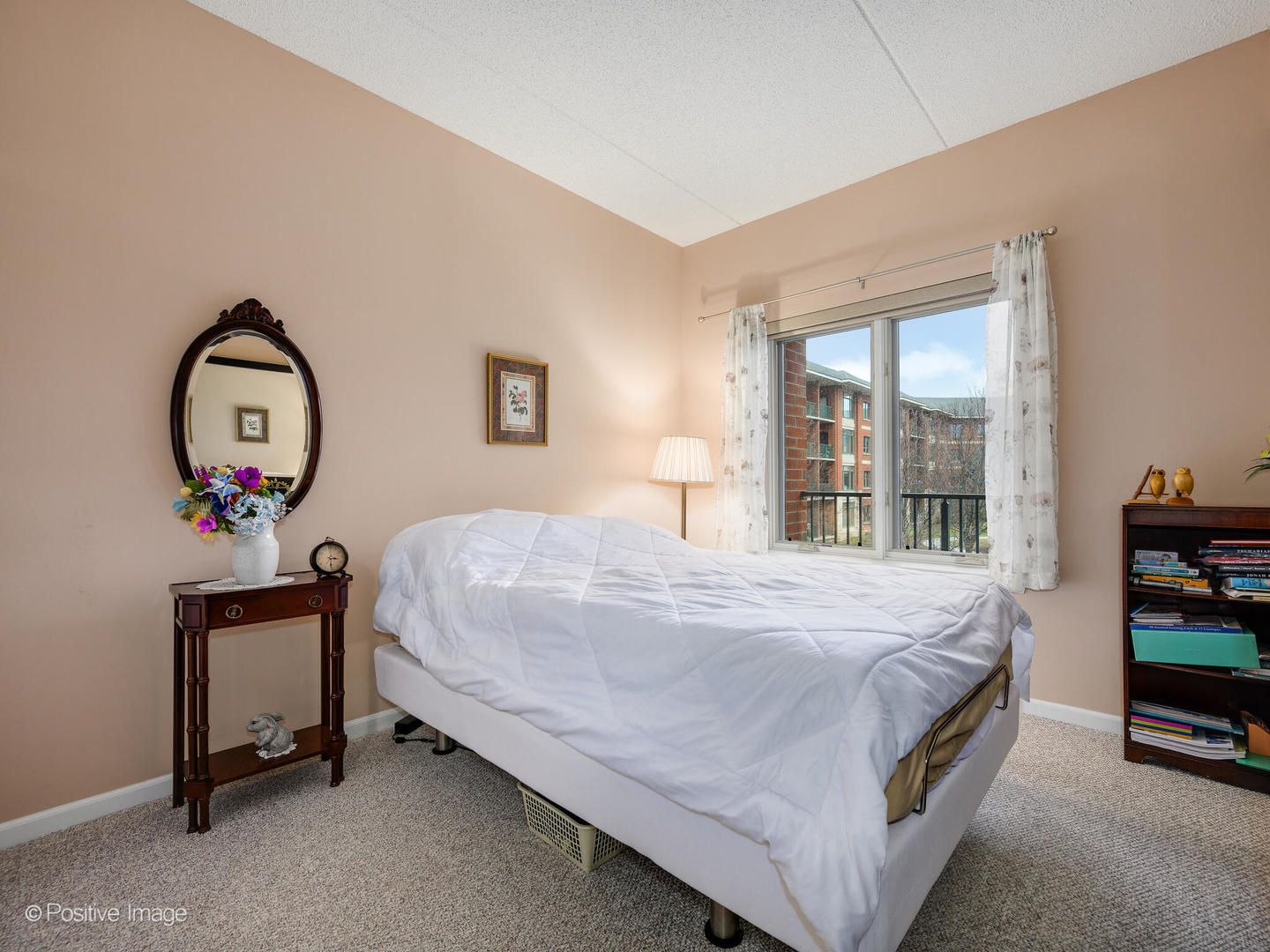 855 East 22nd Street, Unit 217 Lombard, IL 60148 - Photo 14 of 27 a bedroom with bed and a window