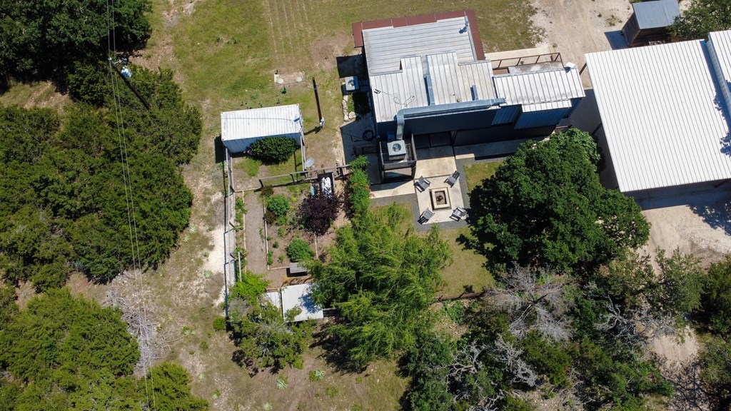 228-232 Spring Road Fredericksburg, TX 78624 - Photo 7 of 57 an aerial view of a house with a yard