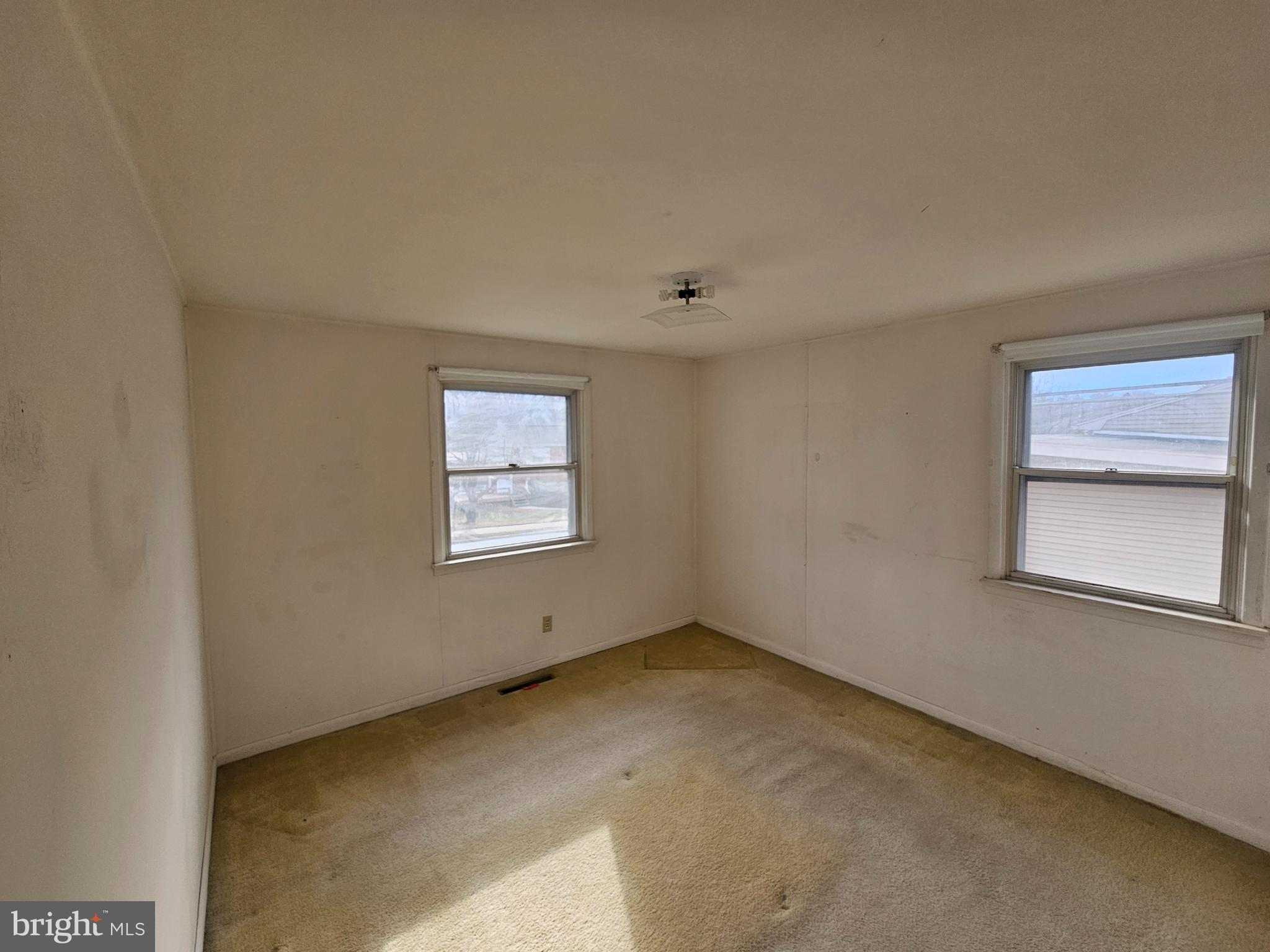 407 East Elm Street Lebanon, PA 17042 - Photo 6 of 16 an empty room with a window