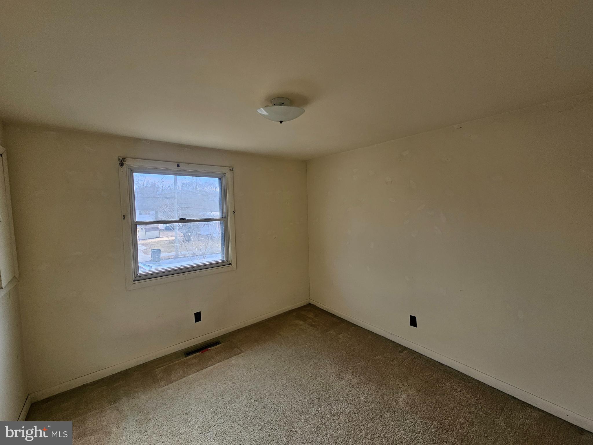 407 East Elm Street Lebanon, PA 17042 - Photo 8 of 16 an empty room with windows