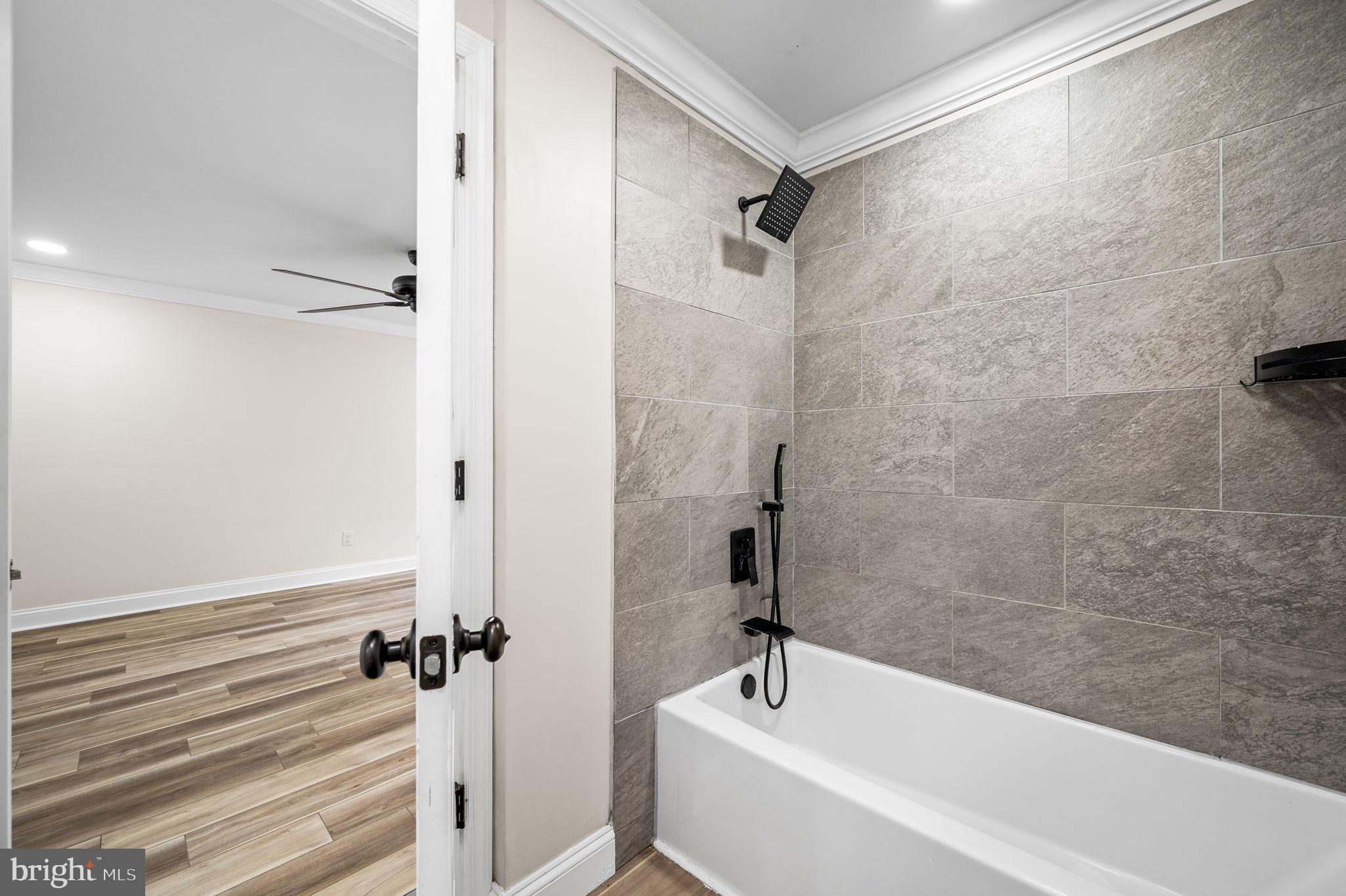 43 Gunning Lane, Unit 12 Downingtown, PA 19335 - Photo 13 of 19 a bathroom with a bathtub and a shower