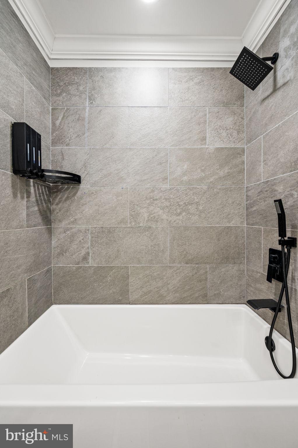 43 Gunning Lane, Unit 12 Downingtown, PA 19335 - Photo 14 of 19 a bathroom with a shower and a shower