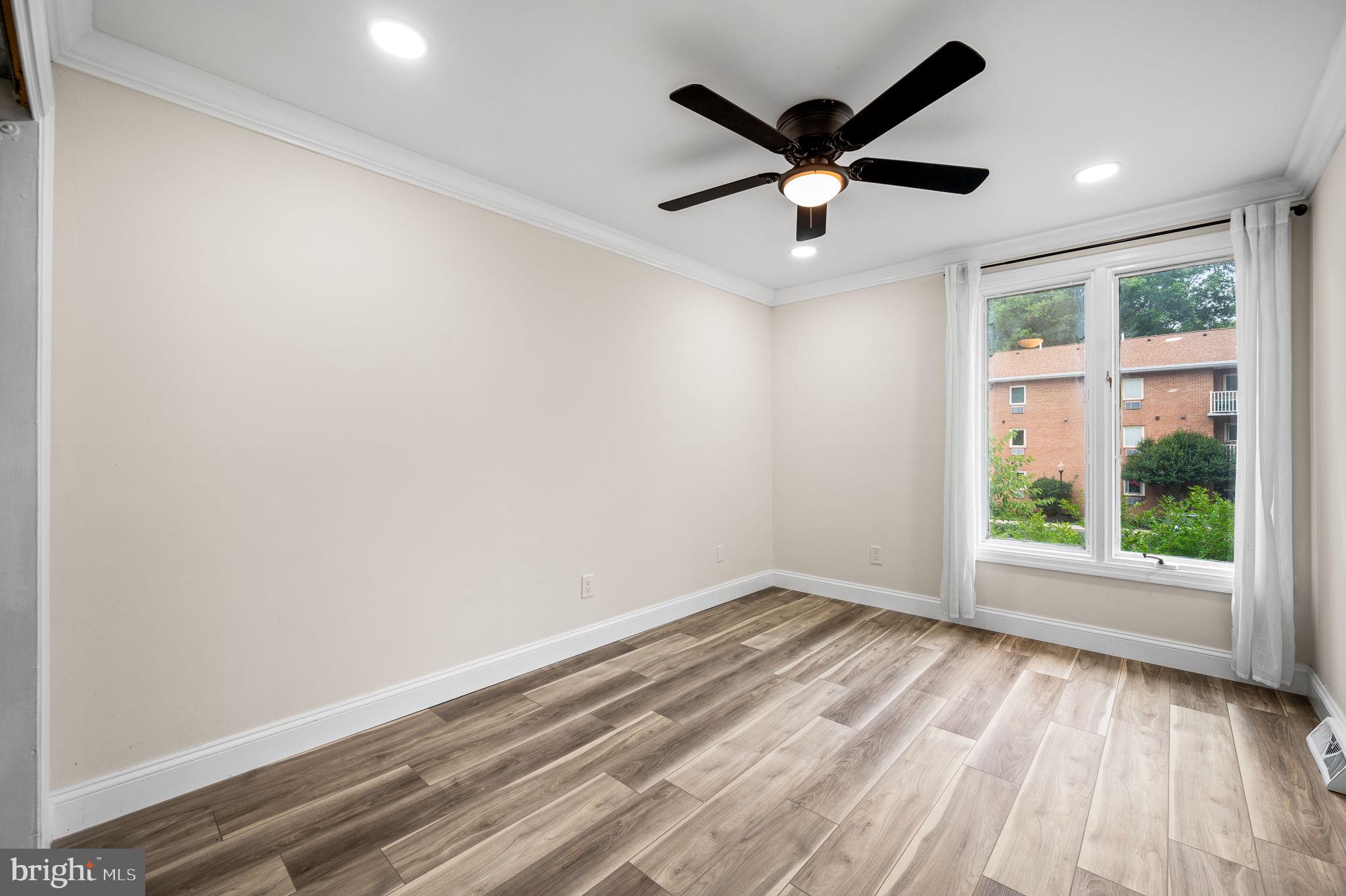 43 Gunning Lane, Unit 12 Downingtown, PA 19335 - Photo 18 of 19 wooden floor in an empty room with a window