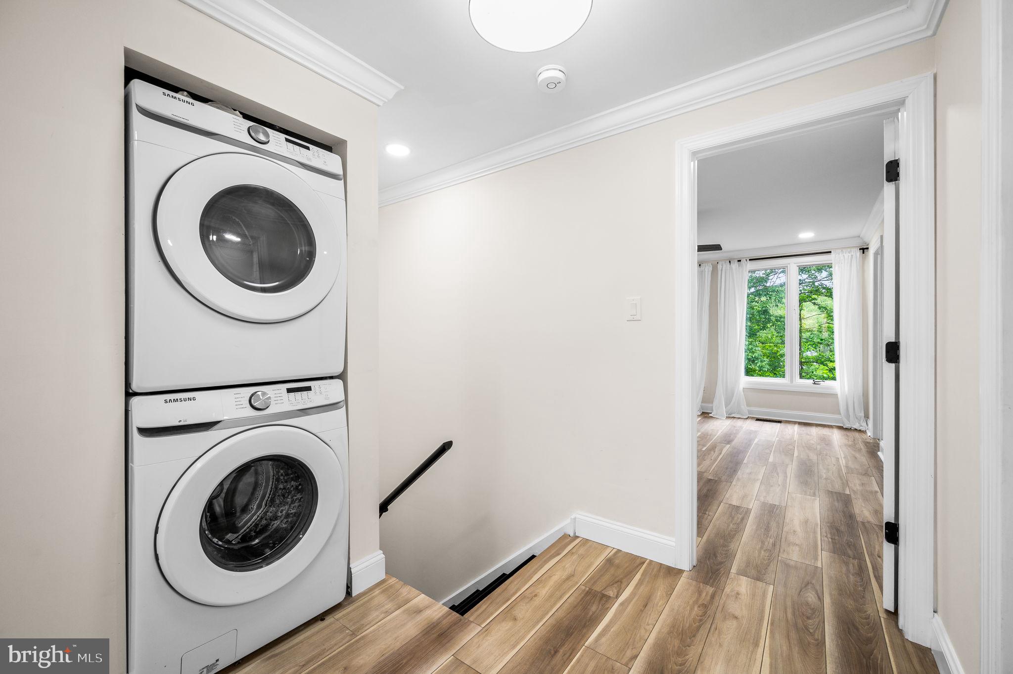 43 Gunning Lane, Unit 12 Downingtown, PA 19335 - Photo 9 of 19 a view of a hallway with washer and dryer