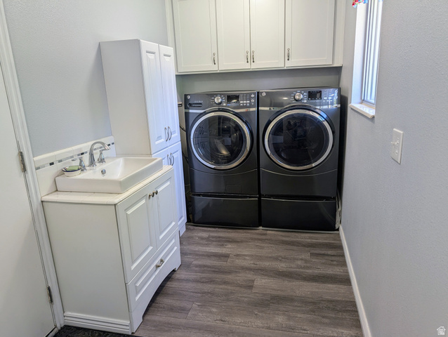 897 East 1200 North Mapleton, UT 84664 - Photo 41 of 54 Laundry room with cabinet space, a textured wall, independent front load washer and dryer