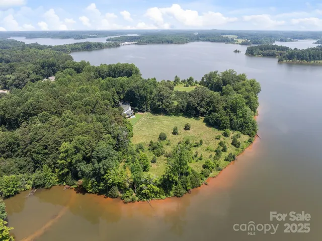 a view of a lake with a yard