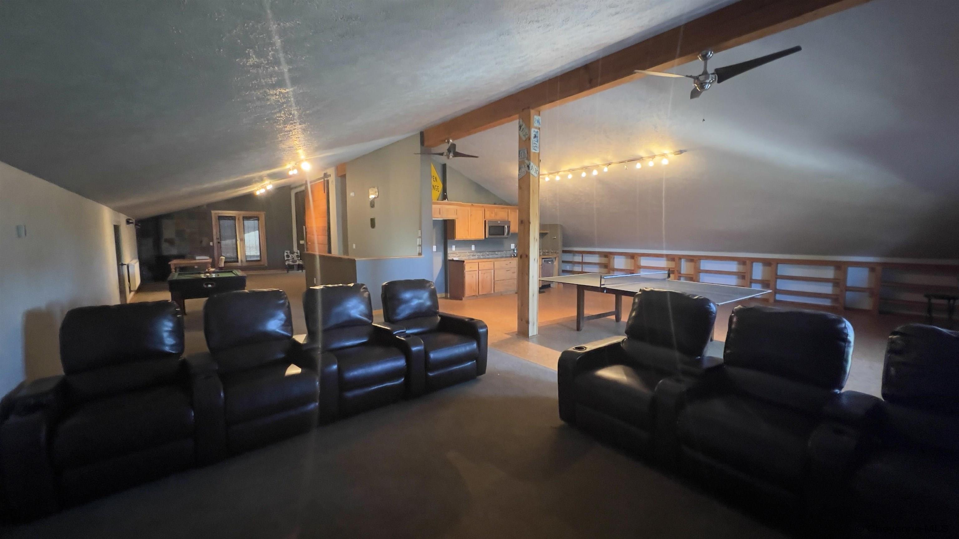 393 Happy Jack Road Cheyenne, WY 82009 - Photo 21 of 34 This is an incredible space with views out the east and west over the backyard and the lake and Curt Gowdy. Tons of space for a game room, theater room, bedroom and living quarters with so many options you could offer nearly anything your mind can imagine