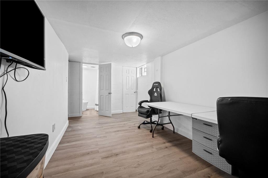 4030 Lebanon Church Road West Mifflin, PA 15122 - Photo 33 of 45 a view of a workspace with furniture and a potted plant