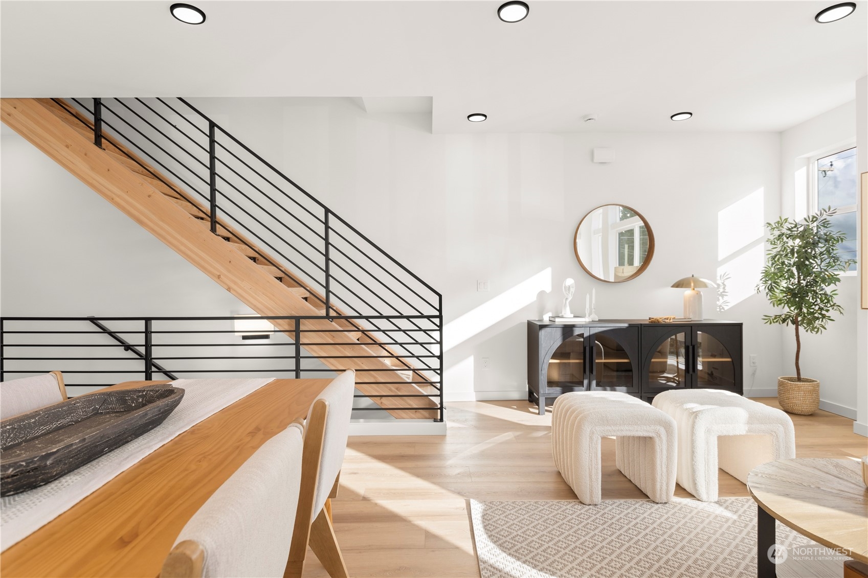 508 North 48th Street Seattle, WA 98103 - Photo 18 of 38 a living room with furniture and a clock