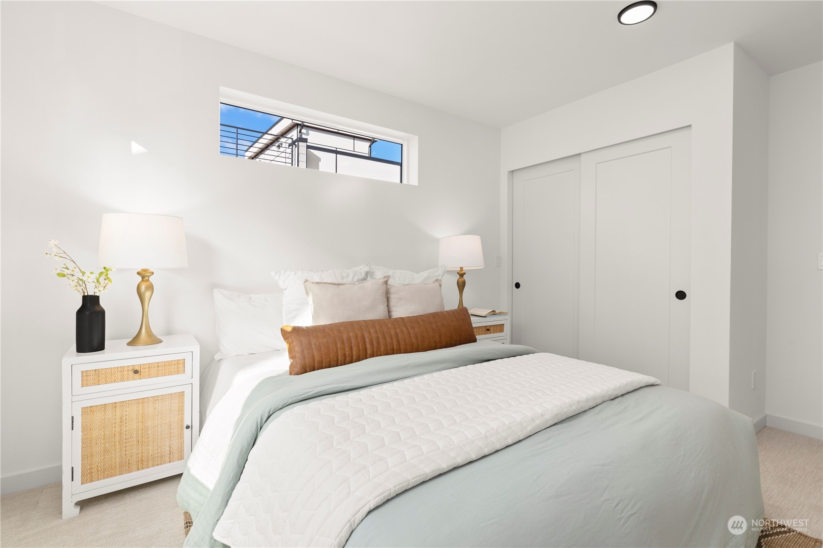 508 North 48th Street Seattle, WA 98103 - Photo 24 of 38 a bedroom with bed and cupboard