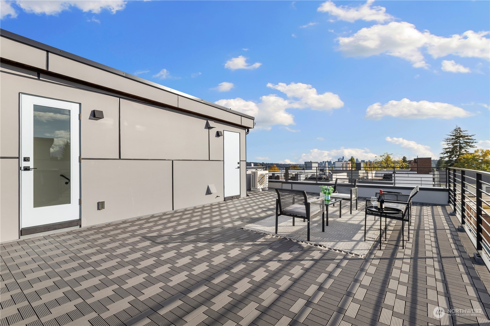 508 North 48th Street Seattle, WA 98103 - Photo 31 of 38 a view of a terrace with furniture and a stove