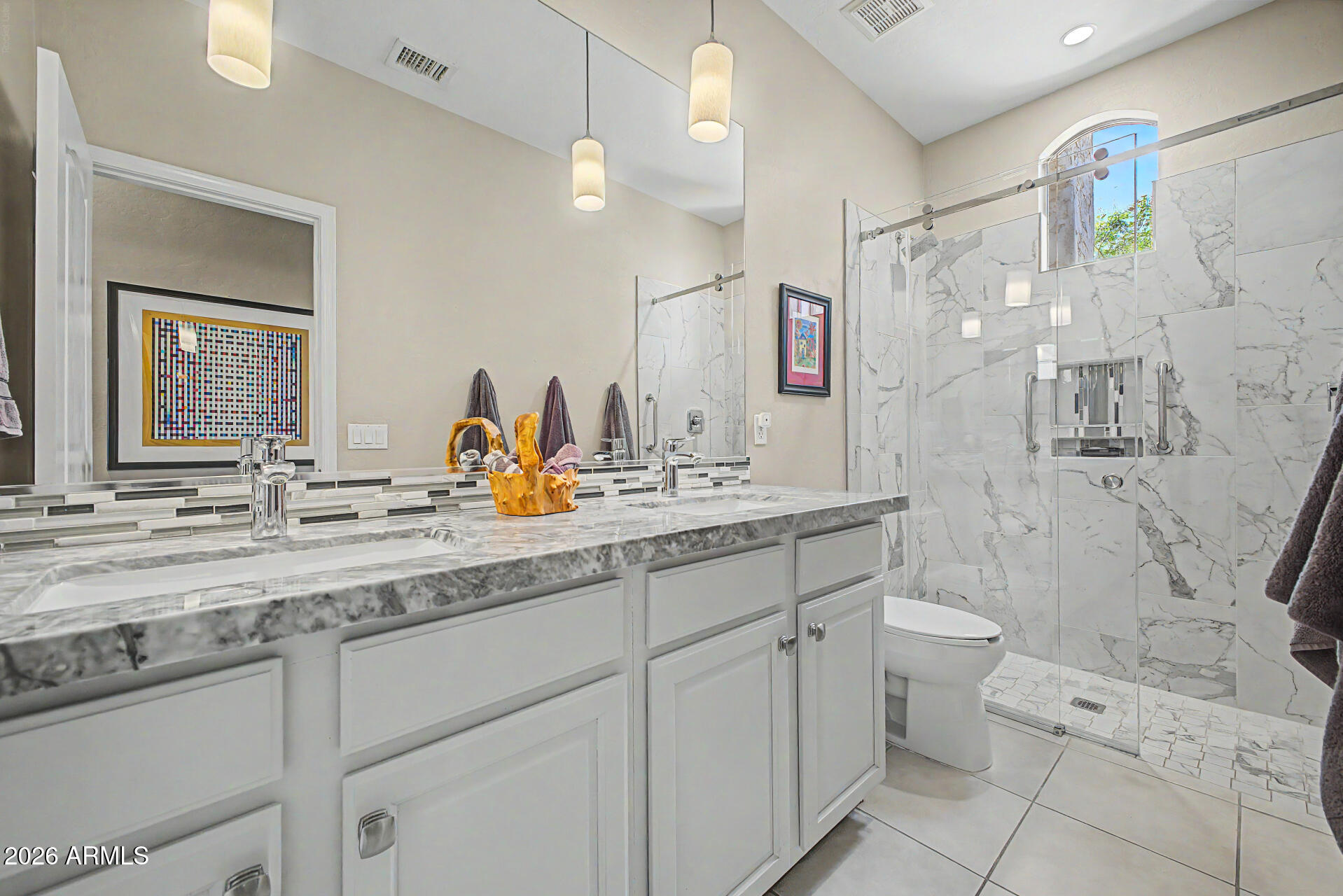 1632 West Frye Road Phoenix, AZ 85045 - Photo 22 of 37 a bathroom with a granite countertop sink mirror vanity and toilet