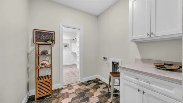 a bedroom with a bed and a ceiling fan