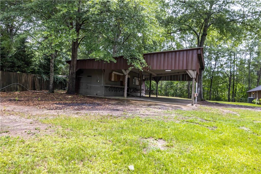 25 Gas Line Road Phenix City, AL 36870 - Photo 49 of 52 View of yard with a carport