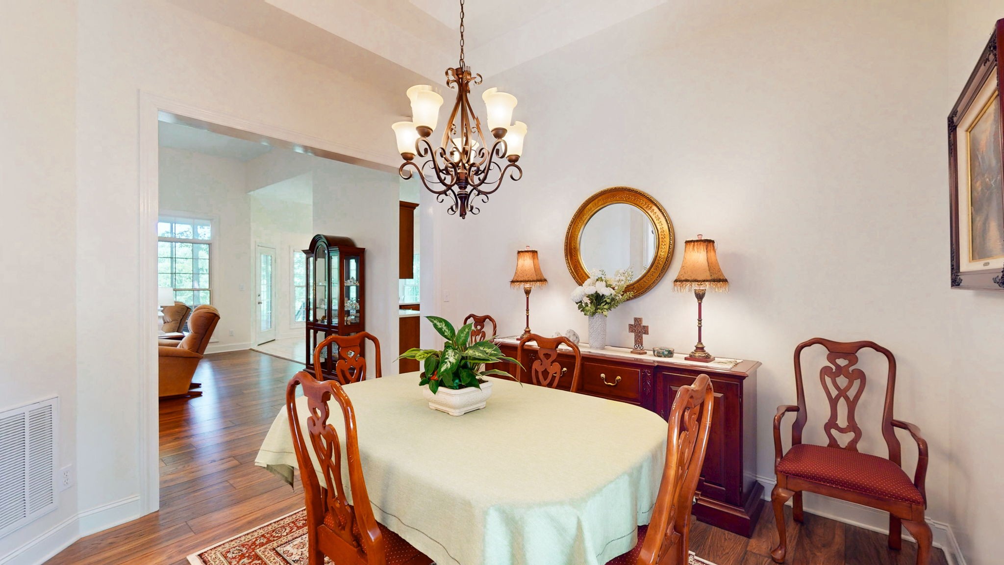 409 Legends Drive Springville, TN 38256 - Photo 12 of 51 a view of a dining room with furniture and a chandelier