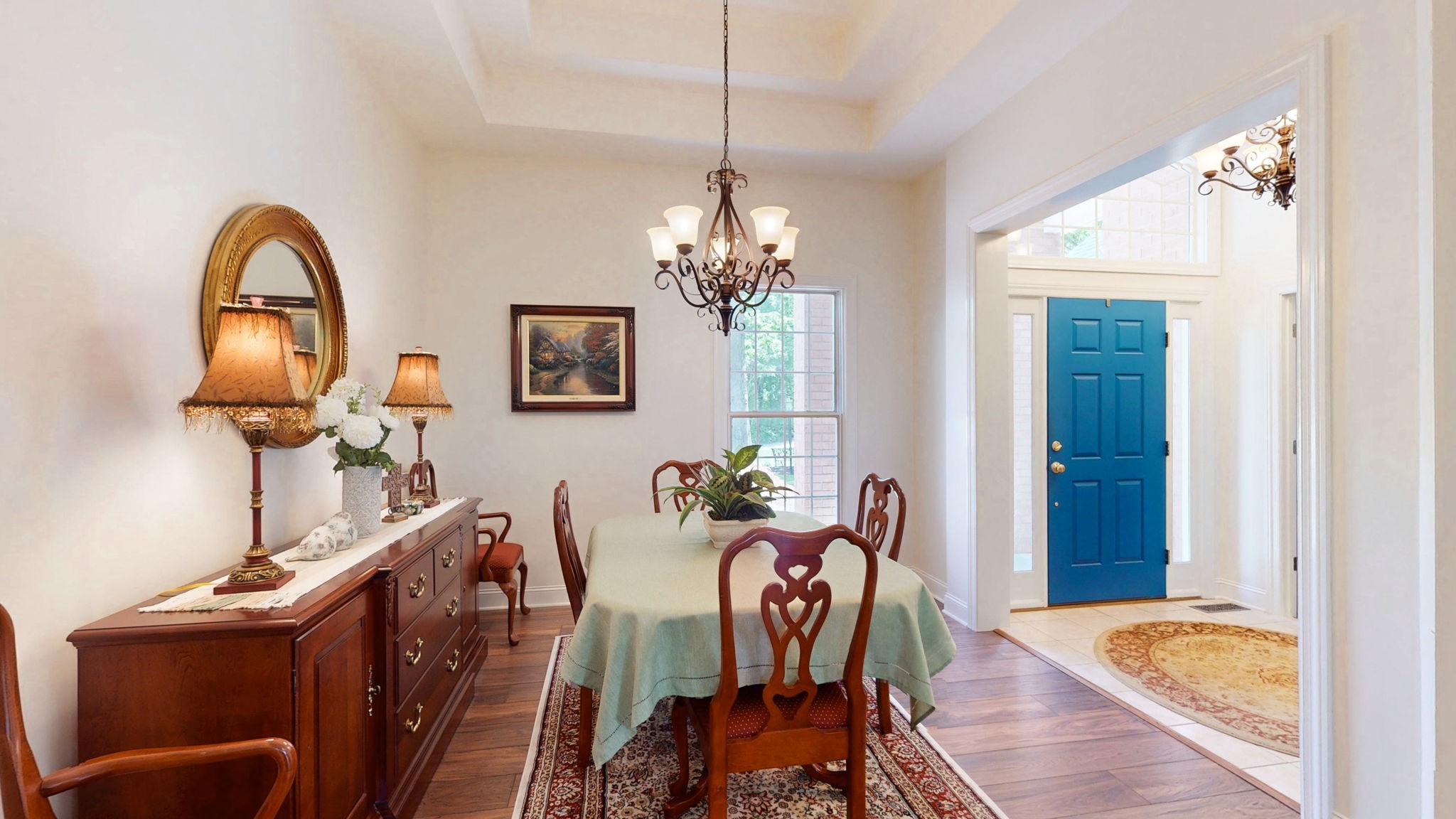 409 Legends Drive Springville, TN 38256 - Photo 13 of 51 a view of a dining room with furniture and chandelier