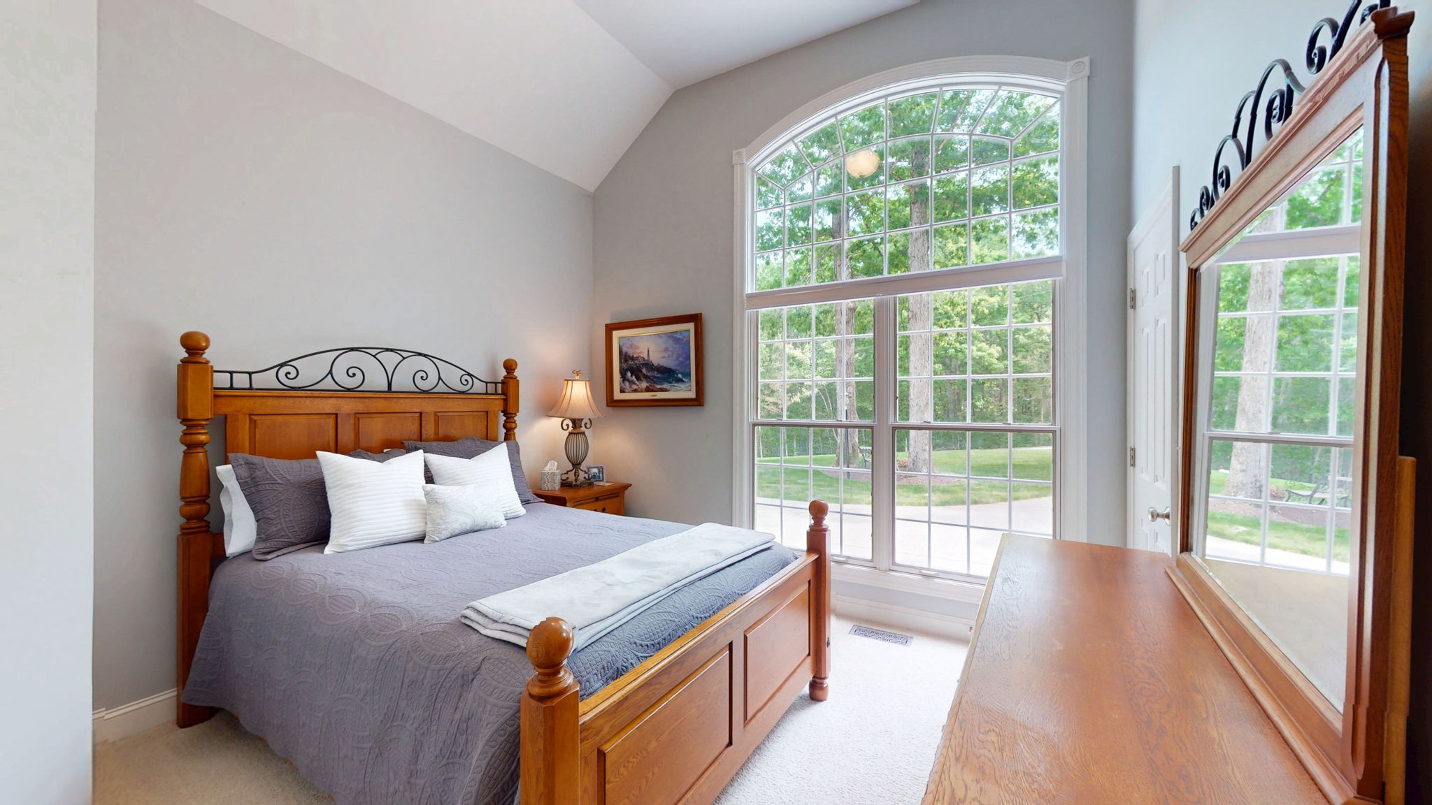 409 Legends Drive Springville, TN 38256 - Photo 19 of 51 a bedroom with a large bed and a large window with outer view