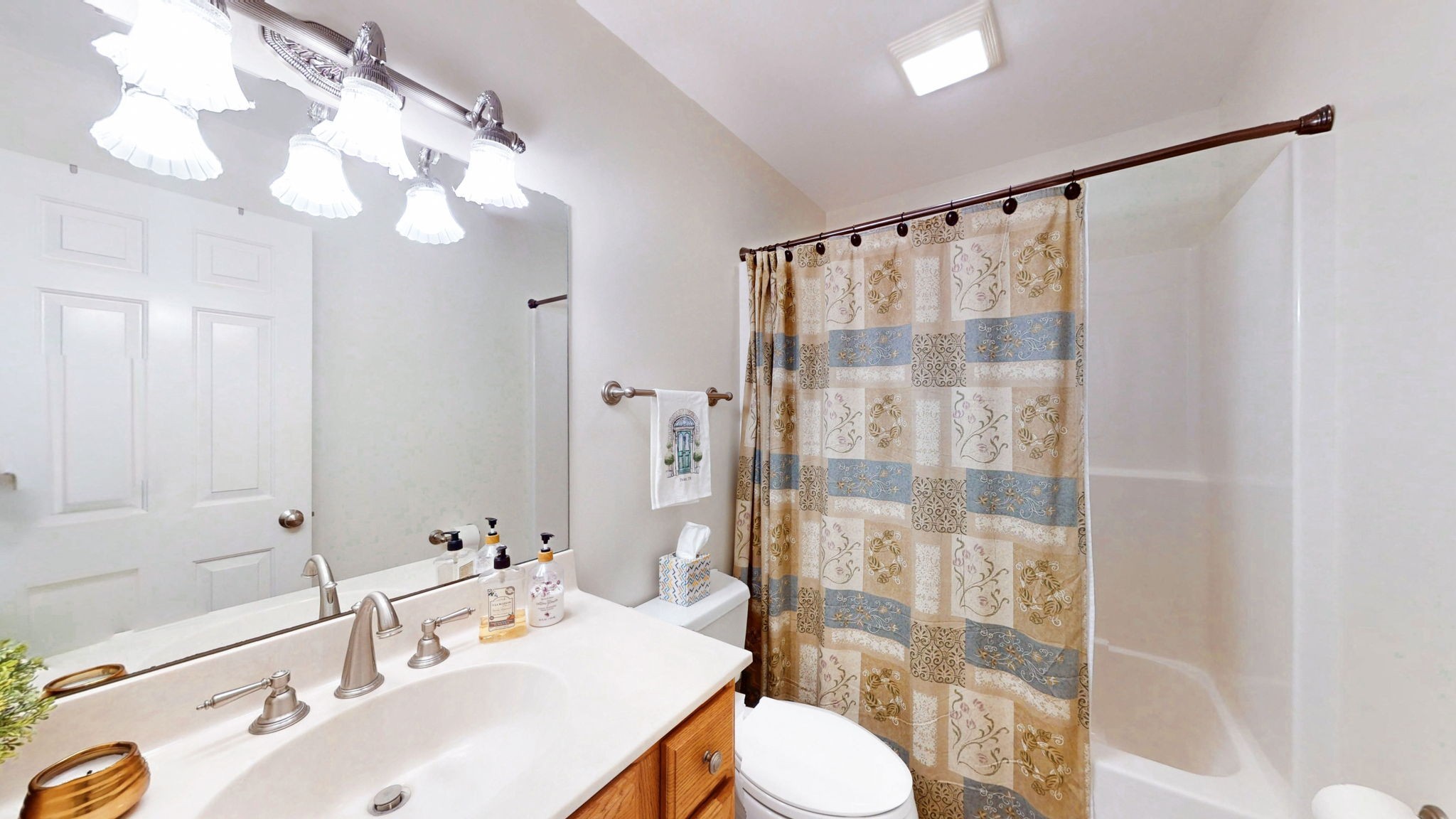 409 Legends Drive Springville, TN 38256 - Photo 21 of 51 a bathroom with a sink vanity granite toilet and shower