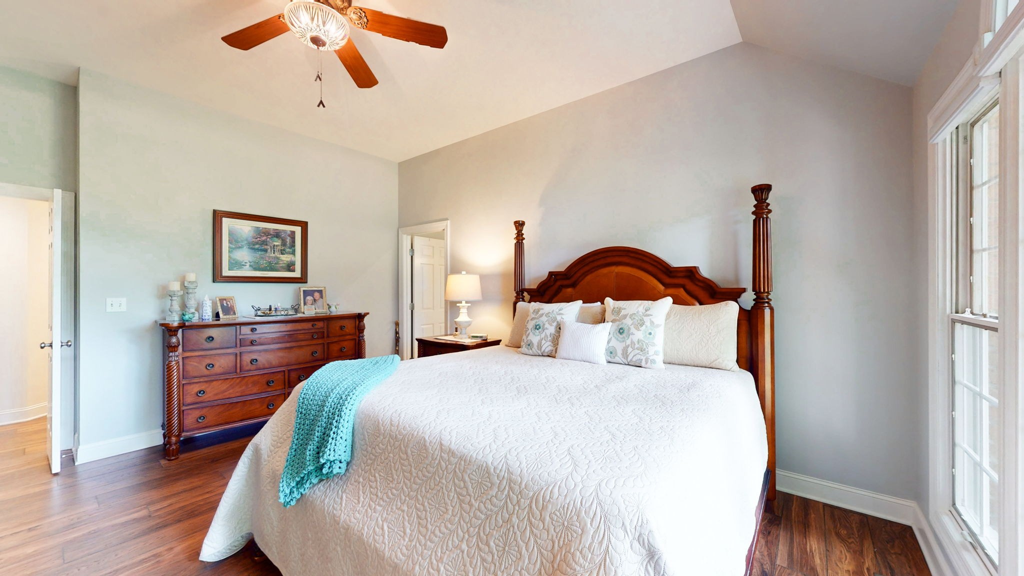 409 Legends Drive Springville, TN 38256 - Photo 23 of 51 a bedroom with a bed and wooden floor