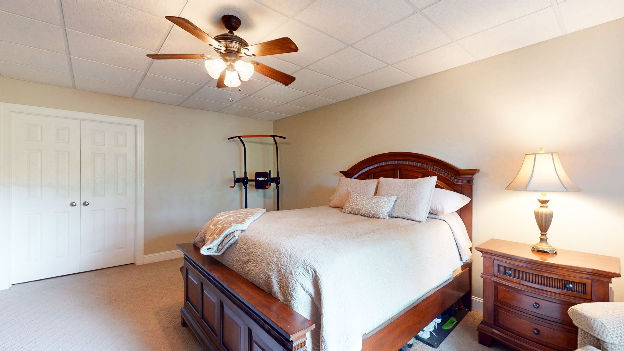 409 Legends Drive Springville, TN 38256 - Photo 26 of 51 a bedroom with bed and a chandelier