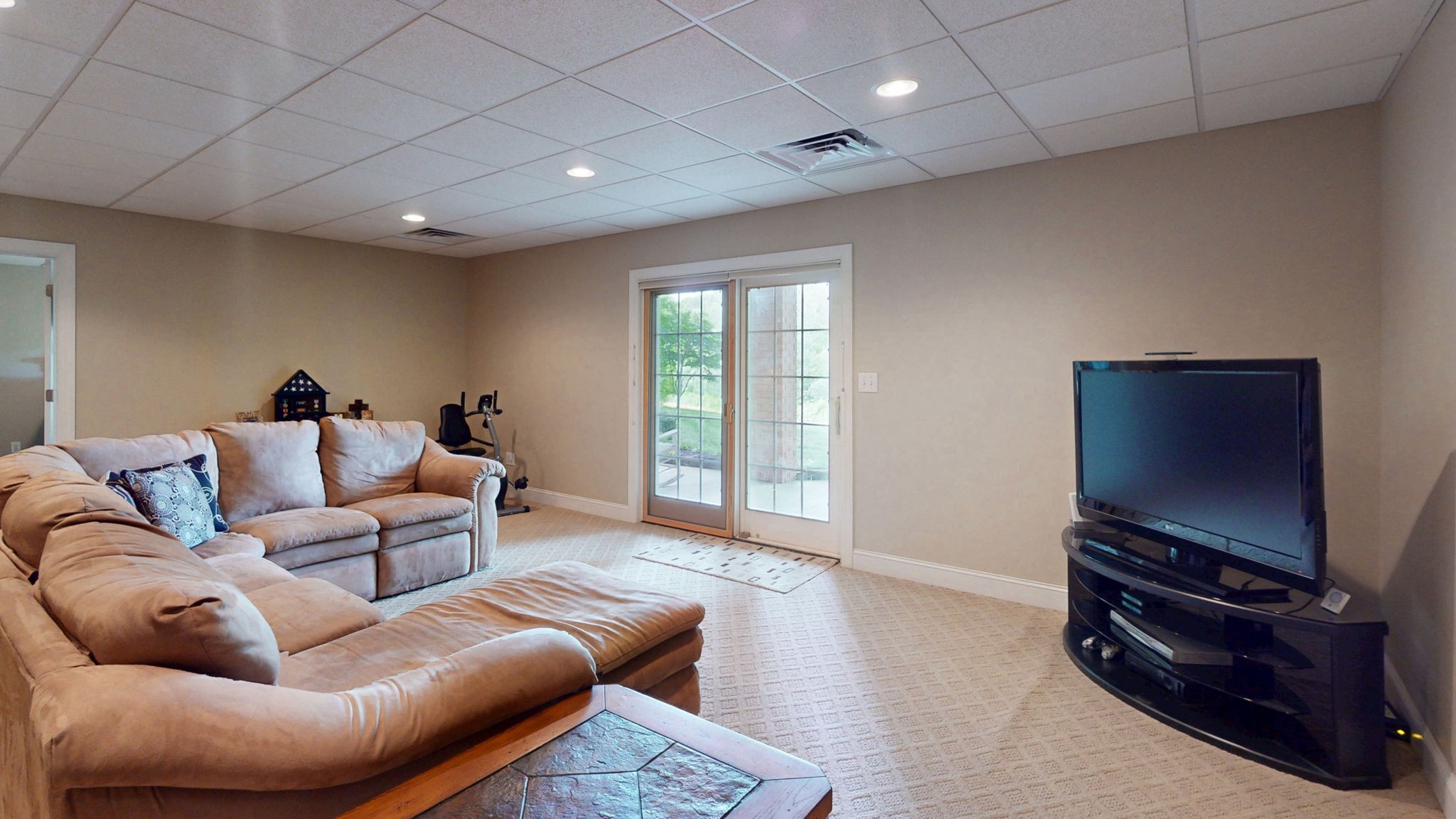 409 Legends Drive Springville, TN 38256 - Photo 28 of 51 a living room with furniture a ceiling fan and a window