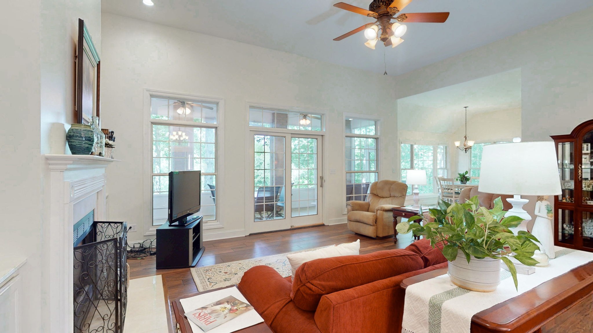 409 Legends Drive Springville, TN 38256 - Photo 3 of 51 a living room with furniture a large window and a flat screen tv