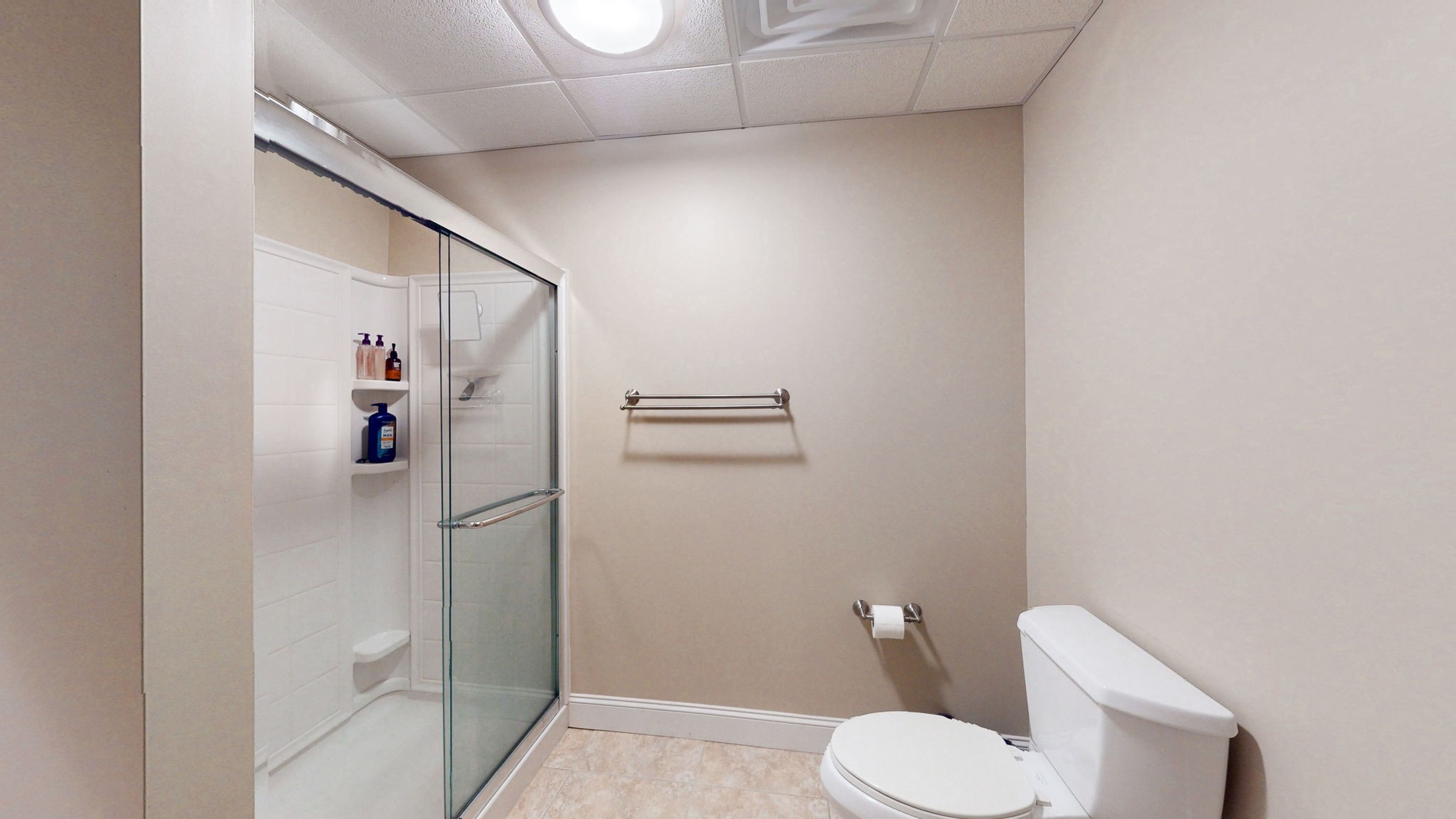 409 Legends Drive Springville, TN 38256 - Photo 31 of 51 a bathroom with a toilet and a shower
