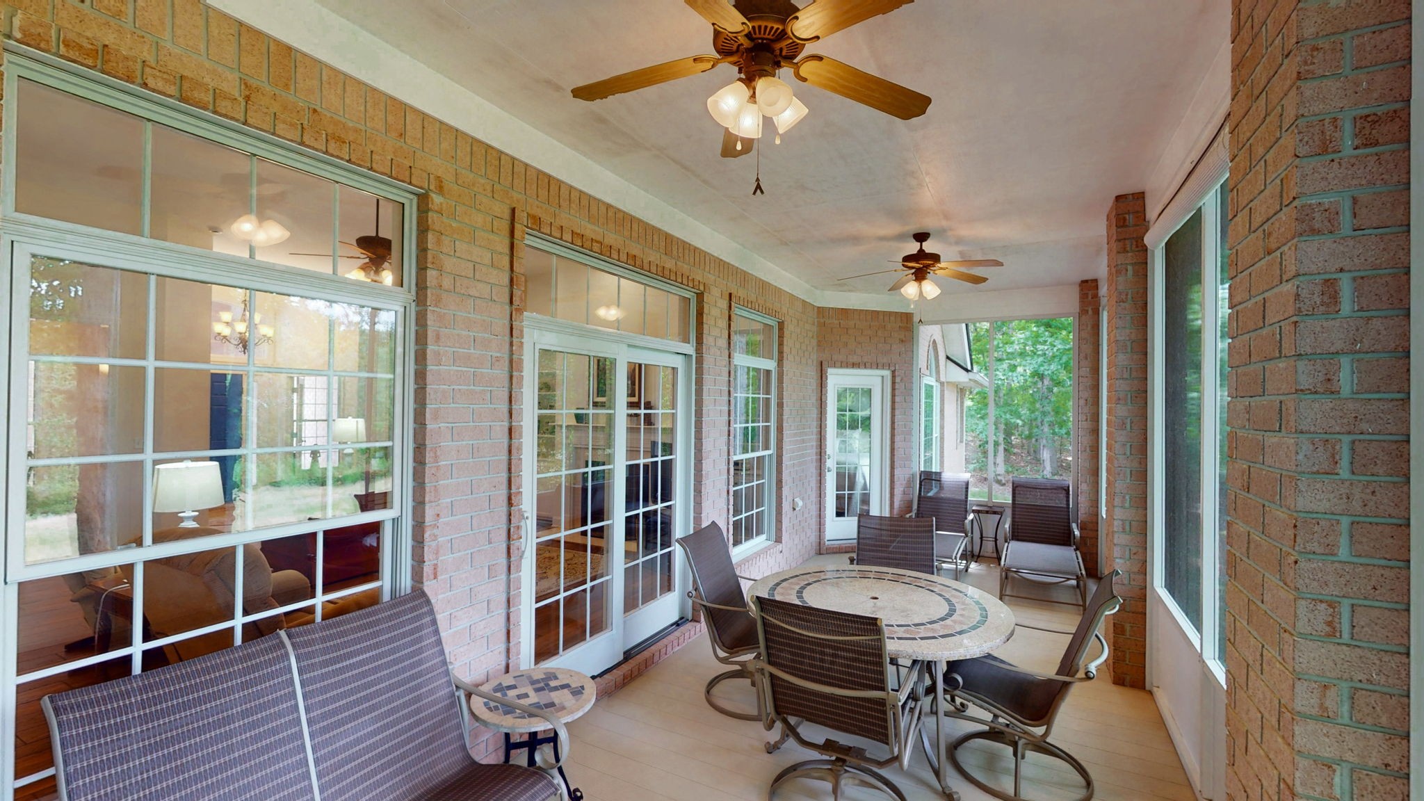 409 Legends Drive Springville, TN 38256 - Photo 35 of 51 a balcony with table and chairs