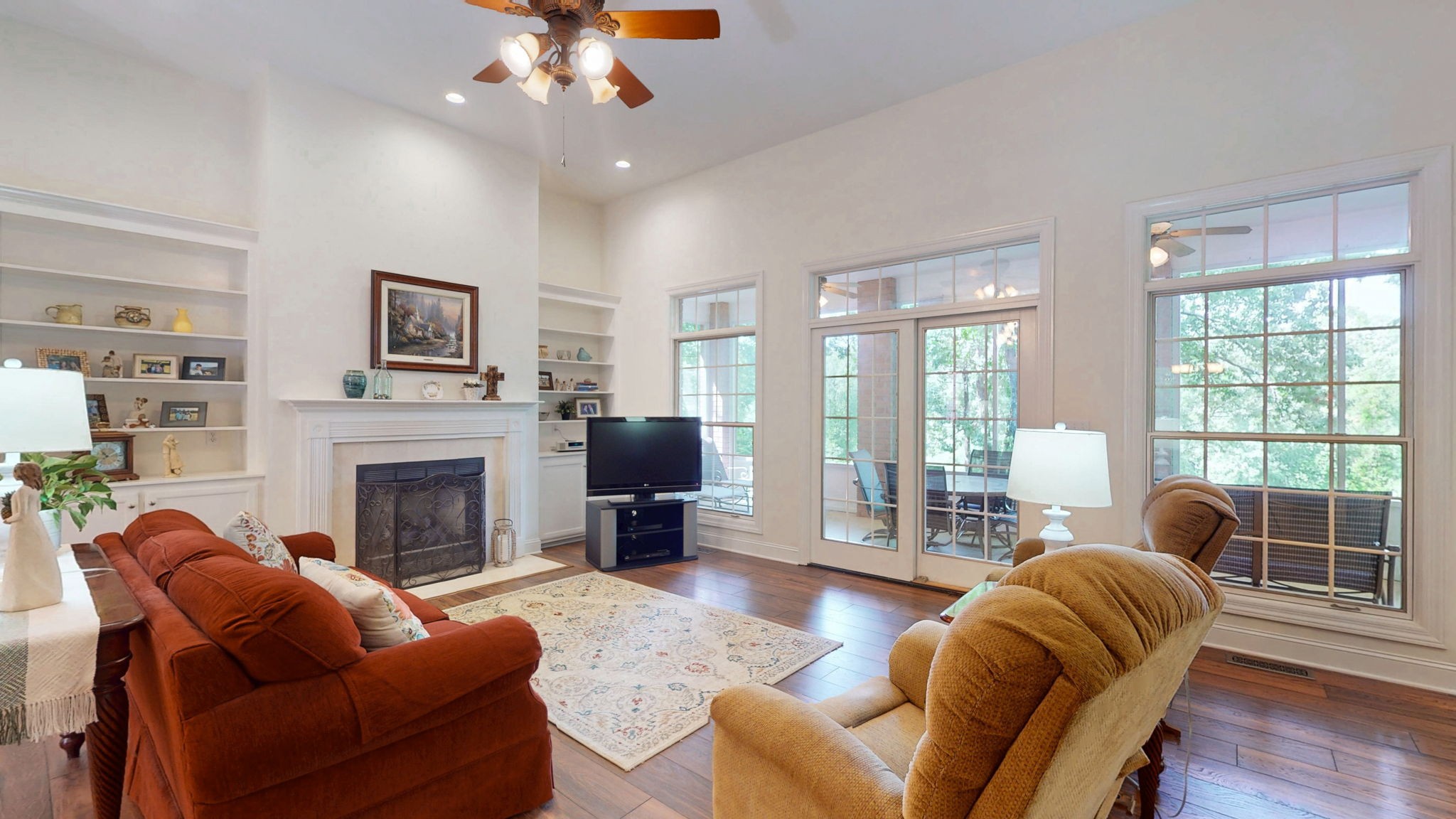 409 Legends Drive Springville, TN 38256 - Photo 4 of 51 a living room with furniture fireplace and flat screen tv