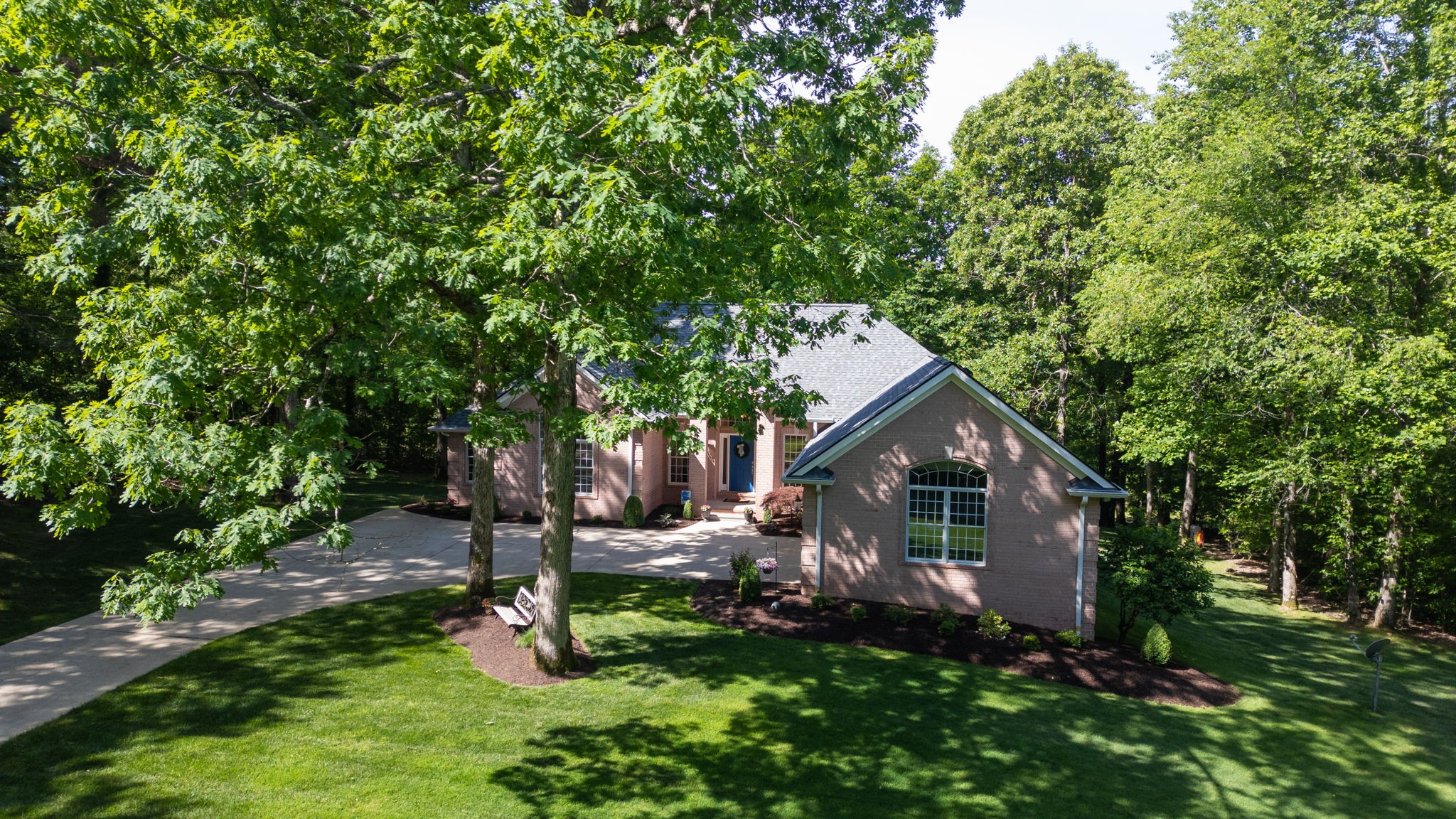 409 Legends Drive Springville, TN 38256 - Photo 47 of 51 a front view of a house with garden