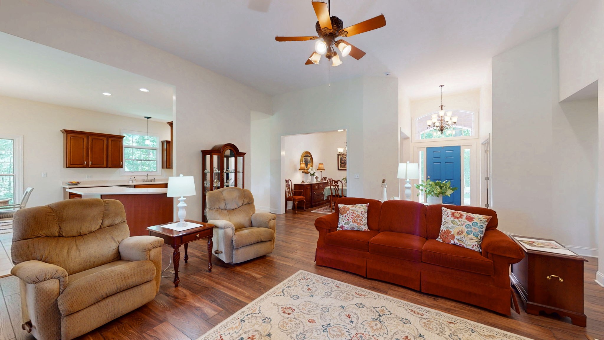409 Legends Drive Springville, TN 38256 - Photo 5 of 51 a living room with furniture ceiling fan and a rug
