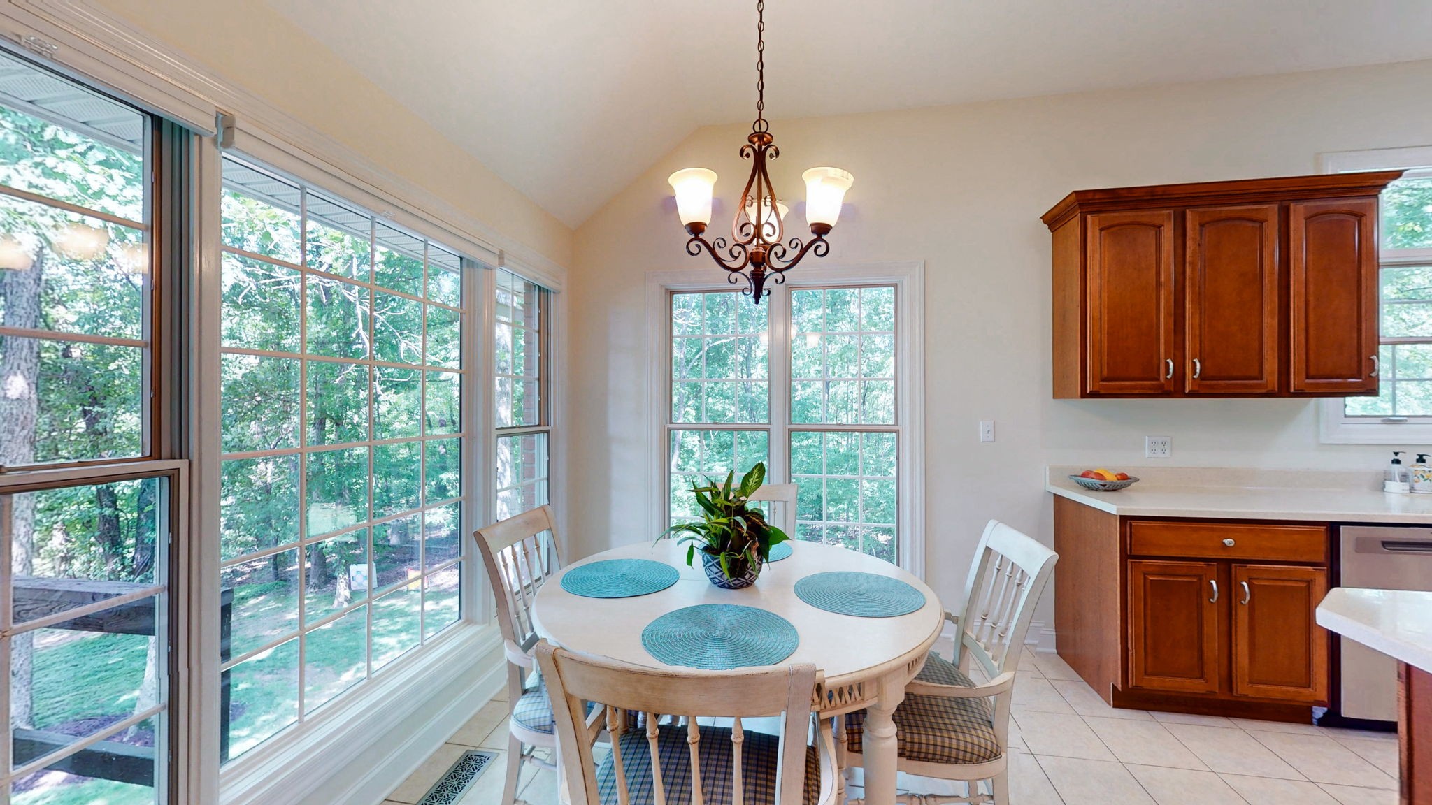 409 Legends Drive Springville, TN 38256 - Photo 10 of 51 a view of a dining room with furniture a chandelier and wooden floor