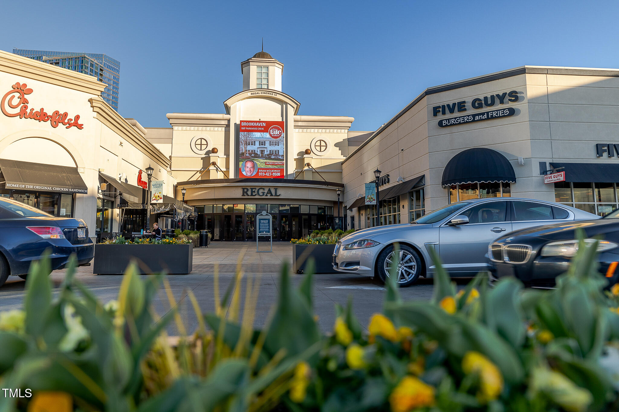806 Tyrrell Road Raleigh, NC 27609 - Photo 10 of 28 a front view of a building with parking
