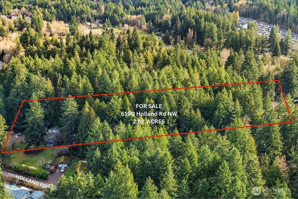 6190 Holland Road Northwest Bremerton, WA 98311 - Photo 2 of 10 a view of a garden