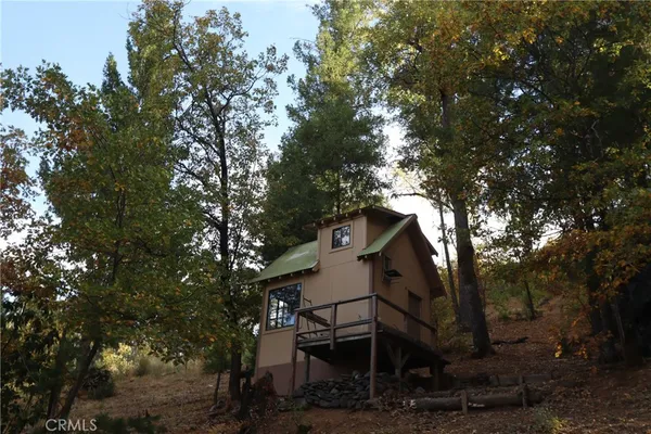 a house view with a tree
